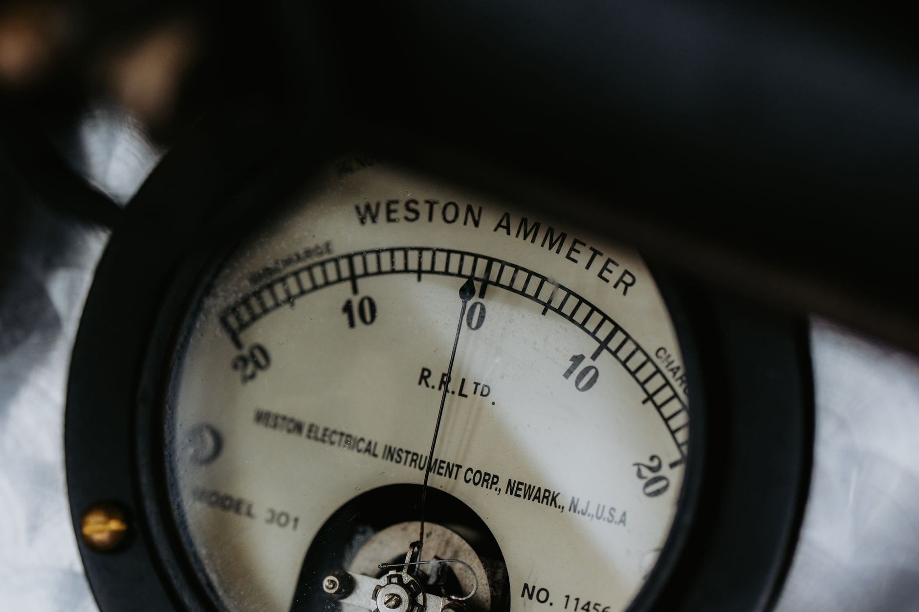 Detailed shot of a classic Weston Electrical Ammeter, showcasing its intricate design and craftsmanship.